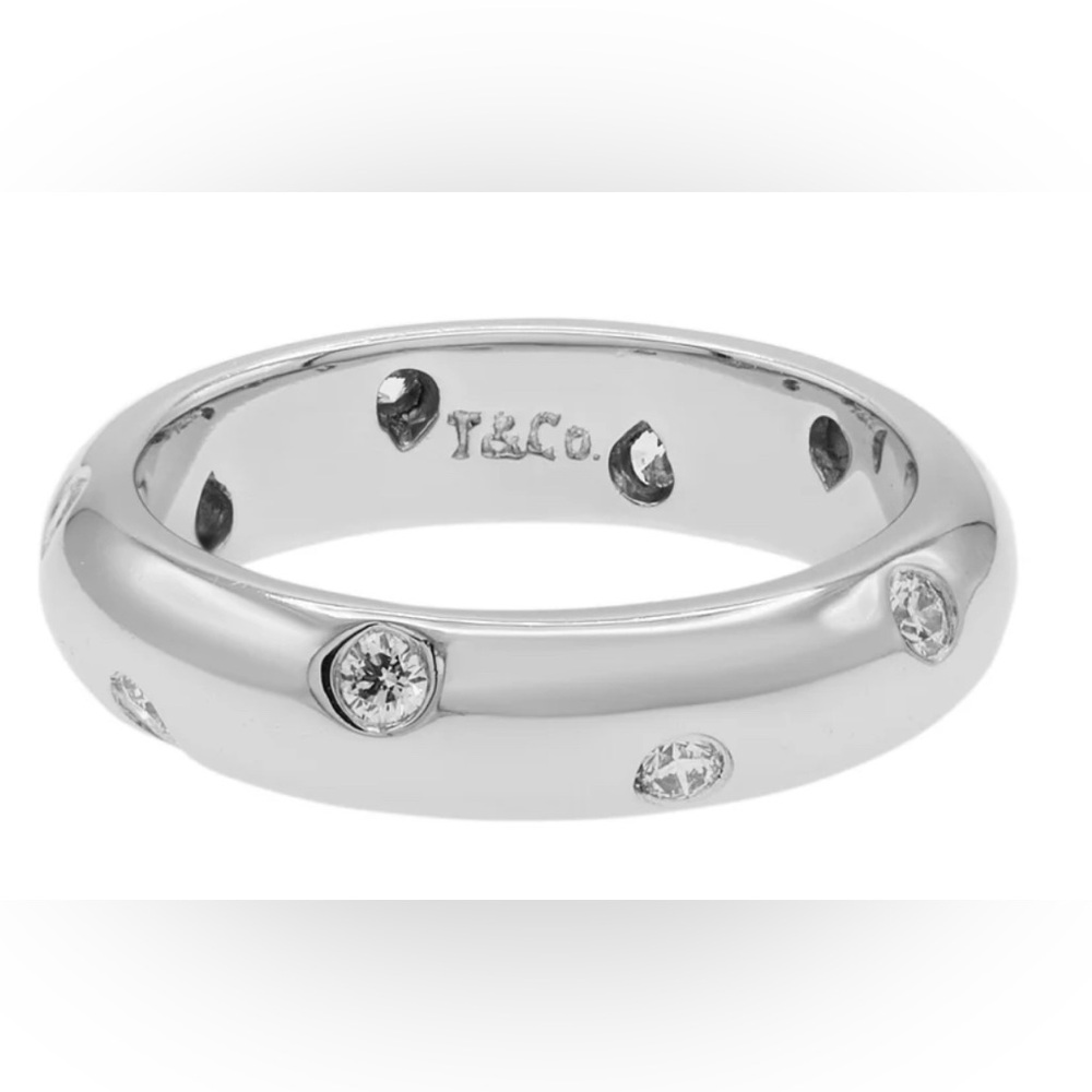 TIFFANY & CO. PLATINUM DIAMOND 4MM ETOILE RING